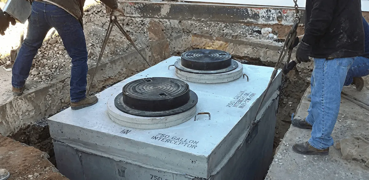 Grease trap installation for a commercial property drainage system in Spokane, WA